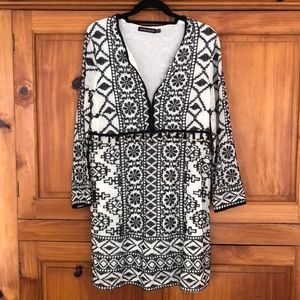 Never worn. Gauze. Deep V neck, three eyes hooks